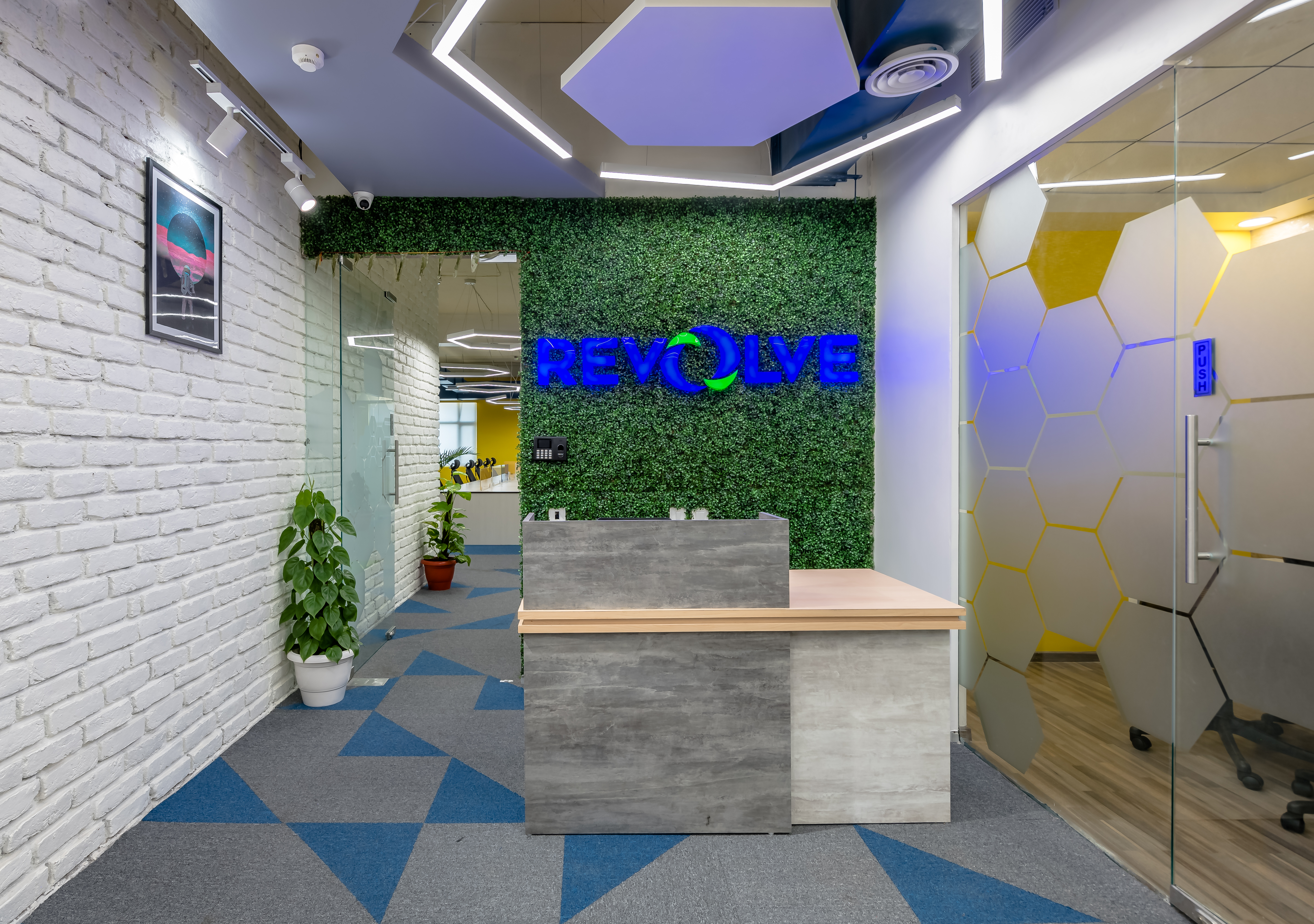 Revolve software company modern office reception with contemporary design in Gurgaon