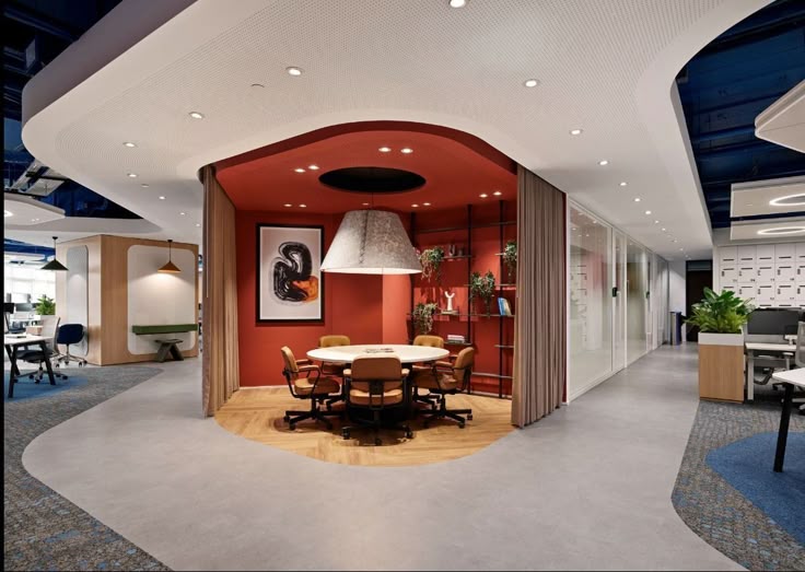 Wellbeing-driven office space with biophilic elements, natural light, and ergonomic furniture